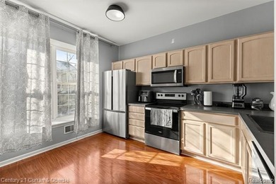 This beautiful 2-bedroom condo in Southfield offers an array of on Evergreen Hills Golf Course in Michigan - for sale on GolfHomes.com, golf home, golf lot