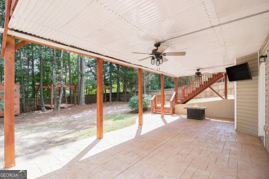 Stunning stucco home in the highly sought-after Summer Grove on Summergrove Golf Club in Georgia - for sale on GolfHomes.com, golf home, golf lot