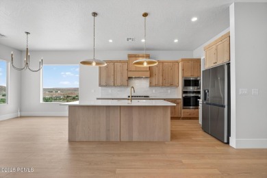 Experience breathtaking views of the city, mountains, and golf on Coral Canyon Golf Course in Utah - for sale on GolfHomes.com, golf home, golf lot