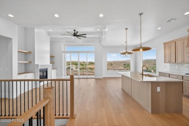 Experience breathtaking views of the city, mountains, and golf on Coral Canyon Golf Course in Utah - for sale on GolfHomes.com, golf home, golf lot