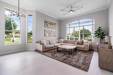 This stunning, renovated estate home is ideally situated within on  in Florida - for sale on GolfHomes.com, golf home, golf lot