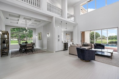 This stunning, renovated estate home is ideally situated within on  in Florida - for sale on GolfHomes.com, golf home, golf lot