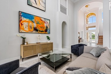 This stunning, renovated estate home is ideally situated within on  in Florida - for sale on GolfHomes.com, golf home, golf lot