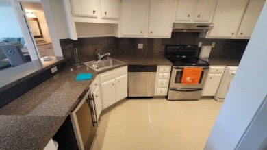 Discover this renovated 2-bedroom, 2-bathroom condo that on  in Florida - for sale on GolfHomes.com, golf home, golf lot