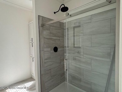 Experience modern Florida living in this stunning new on Barefoot Bay Golf Course in Florida - for sale on GolfHomes.com, golf home, golf lot