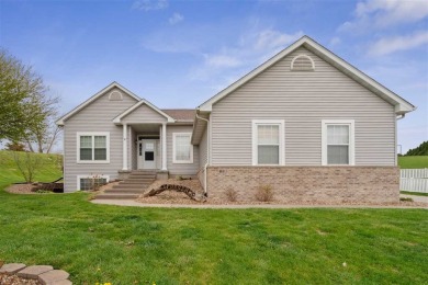 Nestled within an exclusive golf course community, this stunning on Hillcrest Country Club in Iowa - for sale on GolfHomes.com, golf home, golf lot