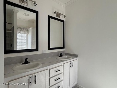 Experience modern Florida living in this stunning new on Barefoot Bay Golf Course in Florida - for sale on GolfHomes.com, golf home, golf lot