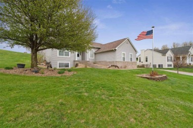 Nestled within an exclusive golf course community, this stunning on Hillcrest Country Club in Iowa - for sale on GolfHomes.com, golf home, golf lot