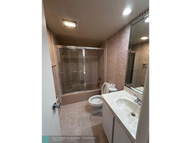 Enjoy breathtaking views of the golf course from your screened on Palm-Aire Country Club and Resort - The Oaks in Florida - for sale on GolfHomes.com, golf home, golf lot