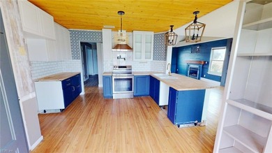 Just a little bit of work will make this house shine! Located in on Eagle Creek Golf Club and Grill in North Carolina - for sale on GolfHomes.com, golf home, golf lot