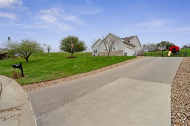 Nestled within an exclusive golf course community, this stunning on Hillcrest Country Club in Iowa - for sale on GolfHomes.com, golf home, golf lot