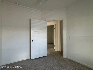 Experience modern Florida living in this stunning new on Barefoot Bay Golf Course in Florida - for sale on GolfHomes.com, golf home, golf lot