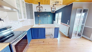 Just a little bit of work will make this house shine! Located in on Eagle Creek Golf Club and Grill in North Carolina - for sale on GolfHomes.com, golf home, golf lot