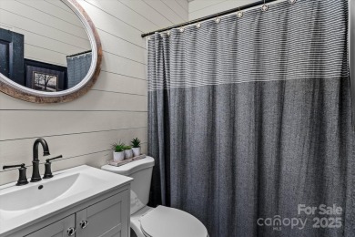 This spacious home offers versatile living,modern updates,and on Highland Creek Golf Club in North Carolina - for sale on GolfHomes.com, golf home, golf lot
