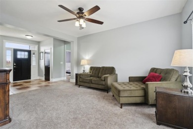 Nestled within an exclusive golf course community, this stunning on Hillcrest Country Club in Iowa - for sale on GolfHomes.com, golf home, golf lot