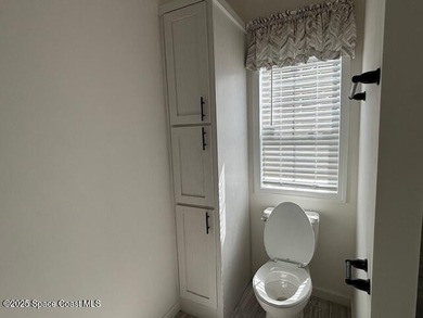 Experience modern Florida living in this stunning new on Barefoot Bay Golf Course in Florida - for sale on GolfHomes.com, golf home, golf lot