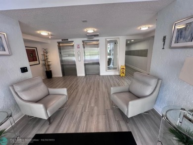 Enjoy breathtaking views of the golf course from your screened on Palm-Aire Country Club and Resort - The Oaks in Florida - for sale on GolfHomes.com, golf home, golf lot