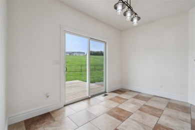 Nestled within an exclusive golf course community, this stunning on Hillcrest Country Club in Iowa - for sale on GolfHomes.com, golf home, golf lot