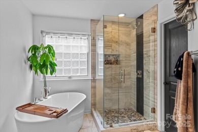 This spacious home offers versatile living,modern updates,and on Highland Creek Golf Club in North Carolina - for sale on GolfHomes.com, golf home, golf lot