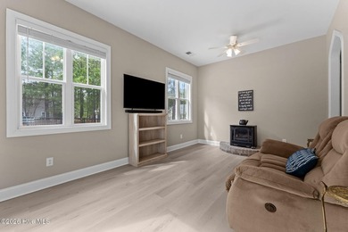 Enjoy the best of lake and golf community living in this on Seven Lakes Country Club in North Carolina - for sale on GolfHomes.com, golf home, golf lot