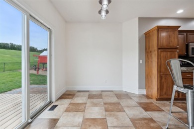 Nestled within an exclusive golf course community, this stunning on Hillcrest Country Club in Iowa - for sale on GolfHomes.com, golf home, golf lot