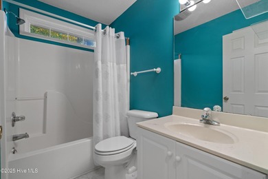 Step into the warmth of 41 Pinewood Drive in Carolina Shores! on Carolina Shores Golf Course in North Carolina - for sale on GolfHomes.com, golf home, golf lot