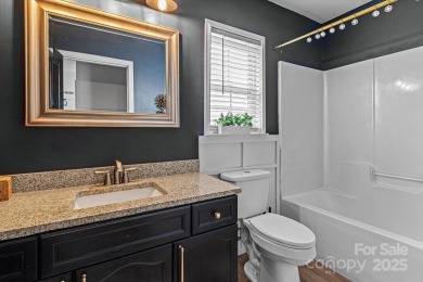 This spacious home offers versatile living,modern updates,and on Highland Creek Golf Club in North Carolina - for sale on GolfHomes.com, golf home, golf lot
