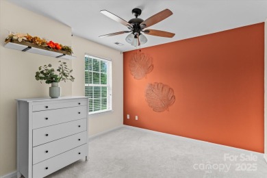 This spacious home offers versatile living,modern updates,and on Highland Creek Golf Club in North Carolina - for sale on GolfHomes.com, golf home, golf lot
