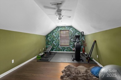 This spacious home offers versatile living,modern updates,and on Highland Creek Golf Club in North Carolina - for sale on GolfHomes.com, golf home, golf lot