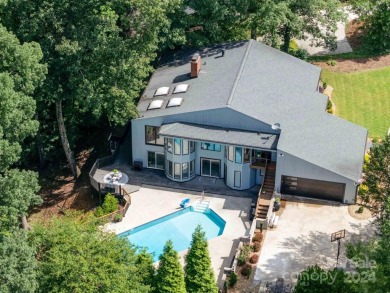 Welcome to this modern oasis! This one-of-a-kind property is on Country Club of Salisbury in North Carolina - for sale on GolfHomes.com, golf home, golf lot