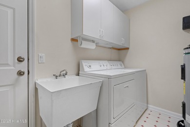 Step into the warmth of 41 Pinewood Drive in Carolina Shores! on Carolina Shores Golf Course in North Carolina - for sale on GolfHomes.com, golf home, golf lot