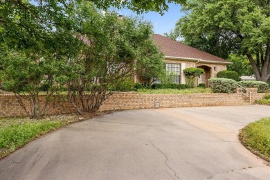 This charming home bursting with potential is the perfect canvas on De Cordova Bend Country Club in Texas - for sale on GolfHomes.com, golf home, golf lot