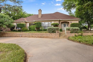 This charming home bursting with potential is the perfect canvas on De Cordova Bend Country Club in Texas - for sale on GolfHomes.com, golf home, golf lot