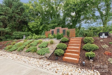 This spacious home offers versatile living,modern updates,and on Highland Creek Golf Club in North Carolina - for sale on GolfHomes.com, golf home, golf lot