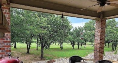 Golf Course Living with Water Views -- No HOA!
Nestled on the on Sugar Tree Golf and Country Club in Texas - for sale on GolfHomes.com, golf home, golf lot