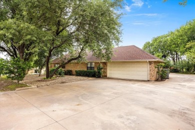 This charming home bursting with potential is the perfect canvas on De Cordova Bend Country Club in Texas - for sale on GolfHomes.com, golf home, golf lot