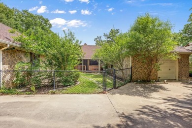This charming home bursting with potential is the perfect canvas on De Cordova Bend Country Club in Texas - for sale on GolfHomes.com, golf home, golf lot