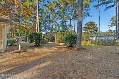 Step into the warmth of 41 Pinewood Drive in Carolina Shores! on Carolina Shores Golf Course in North Carolina - for sale on GolfHomes.com, golf home, golf lot
