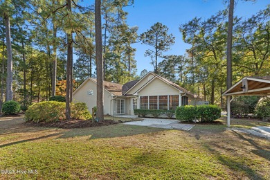 Step into the warmth of 41 Pinewood Drive in Carolina Shores! on Carolina Shores Golf Course in North Carolina - for sale on GolfHomes.com, golf home, golf lot