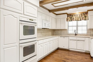 This charming home bursting with potential is the perfect canvas on De Cordova Bend Country Club in Texas - for sale on GolfHomes.com, golf home, golf lot