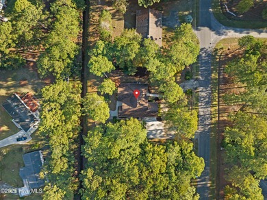 Step into the warmth of 41 Pinewood Drive in Carolina Shores! on Carolina Shores Golf Course in North Carolina - for sale on GolfHomes.com, golf home, golf lot