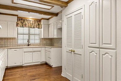 This charming home bursting with potential is the perfect canvas on De Cordova Bend Country Club in Texas - for sale on GolfHomes.com, golf home, golf lot