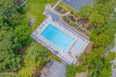 Step into the warmth of 41 Pinewood Drive in Carolina Shores! on Carolina Shores Golf Course in North Carolina - for sale on GolfHomes.com, golf home, golf lot