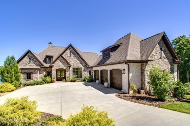 A STORYBOOK HOME ON TELLICO LAKE. 

Tucked into the scenic on Tellico Village -The Links At Kahite Golf Course in Tennessee - for sale on GolfHomes.com, golf home, golf lot
