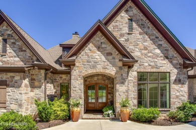 A STORYBOOK HOME ON TELLICO LAKE. 

Tucked into the scenic on Tellico Village -The Links At Kahite Golf Course in Tennessee - for sale on GolfHomes.com, golf home, golf lot