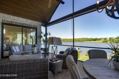 A STORYBOOK HOME ON TELLICO LAKE. 

Tucked into the scenic on Tellico Village -The Links At Kahite Golf Course in Tennessee - for sale on GolfHomes.com, golf home, golf lot