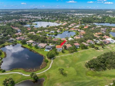 Welcome to this exquisite former model home custom built by on Bayou Golf Club in Florida - for sale on GolfHomes.com, golf home, golf lot