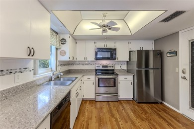 Discover this beautifully maintained 2-bedroom, 2-bathroom on Timber Pines Golf Course in Florida - for sale on GolfHomes.com, golf home, golf lot