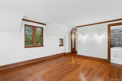 Sited adjacent to, and enjoying the views of the expansive on North Hempstead Country Club in New York - for sale on GolfHomes.com, golf home, golf lot