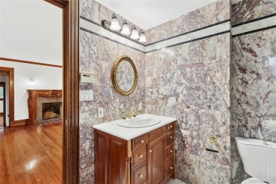 Sited adjacent to, and enjoying the views of the expansive on North Hempstead Country Club in New York - for sale on GolfHomes.com, golf home, golf lot